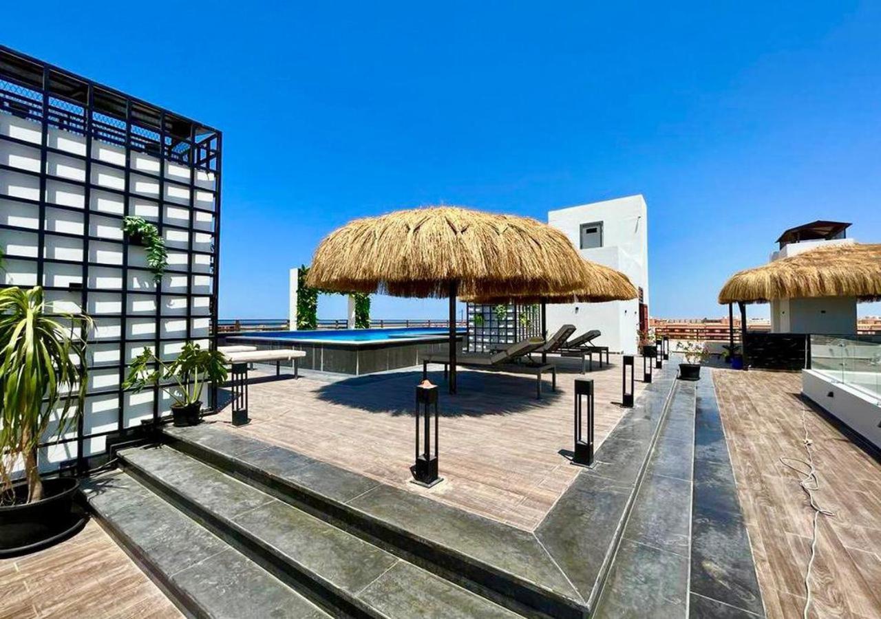 Sanctuary Sunlit Hurghada Haven With 4 Pools, Rooftop Sunsets & Gourmet Bites Steps Away 外观 照片